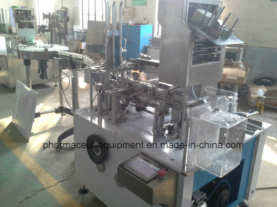 Машина для упаковки в картонные коробки для суппозиториев